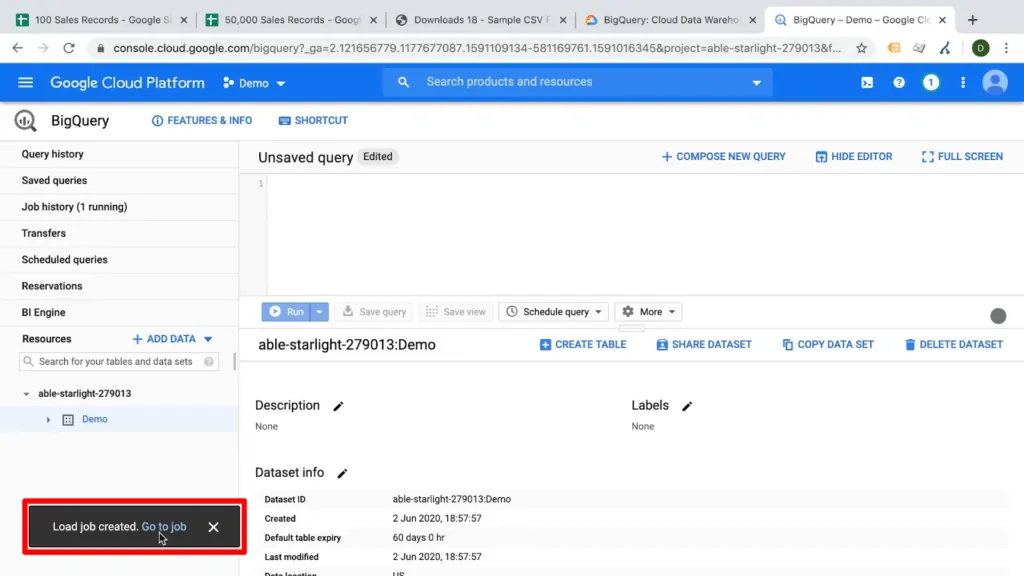 Screenshot of BigQuery dashboard with “load job created” notification highlighted